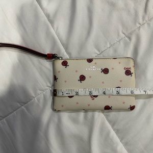 Coach Ladybug Corner Zip Wrislet